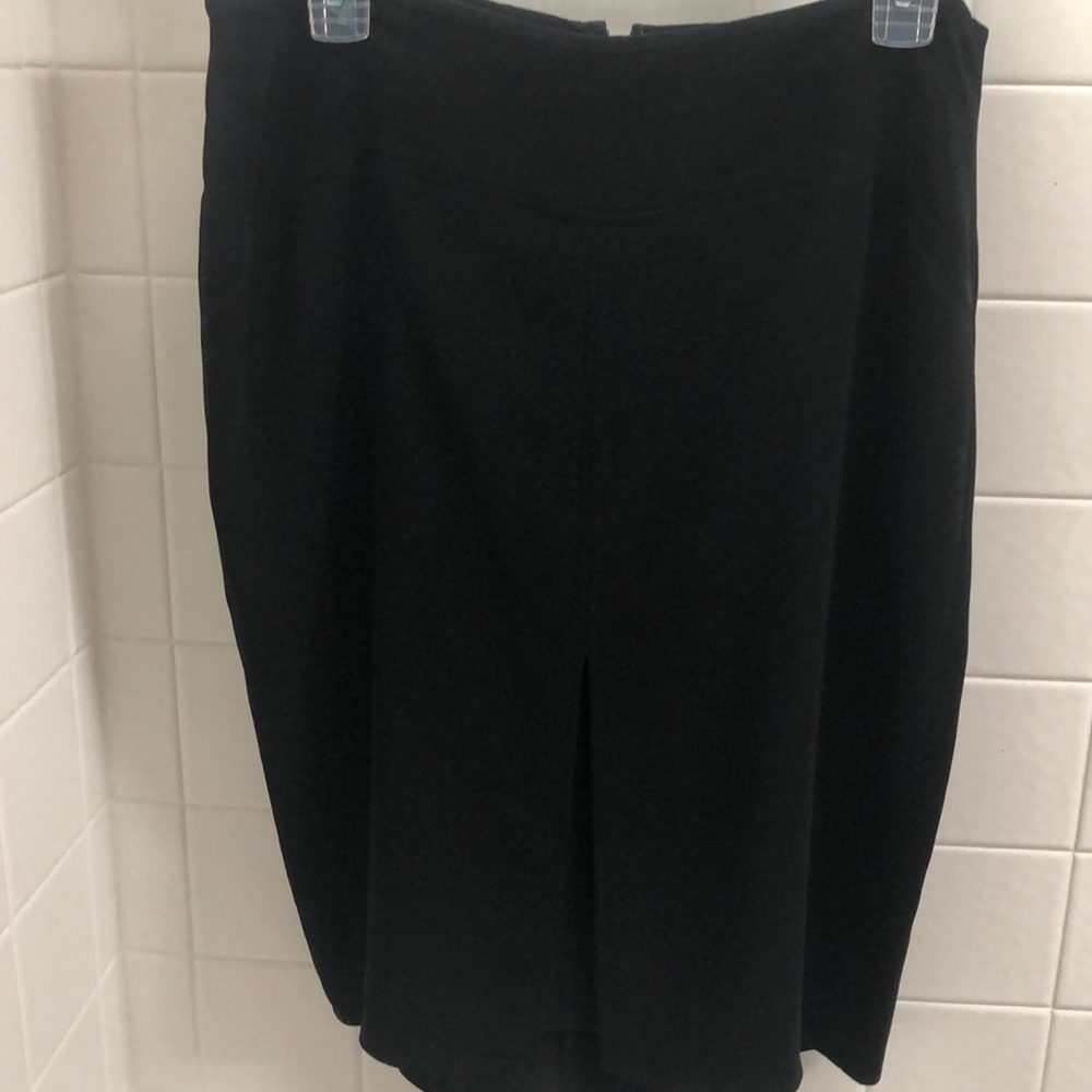 Silk black skirt with fun kick pleat